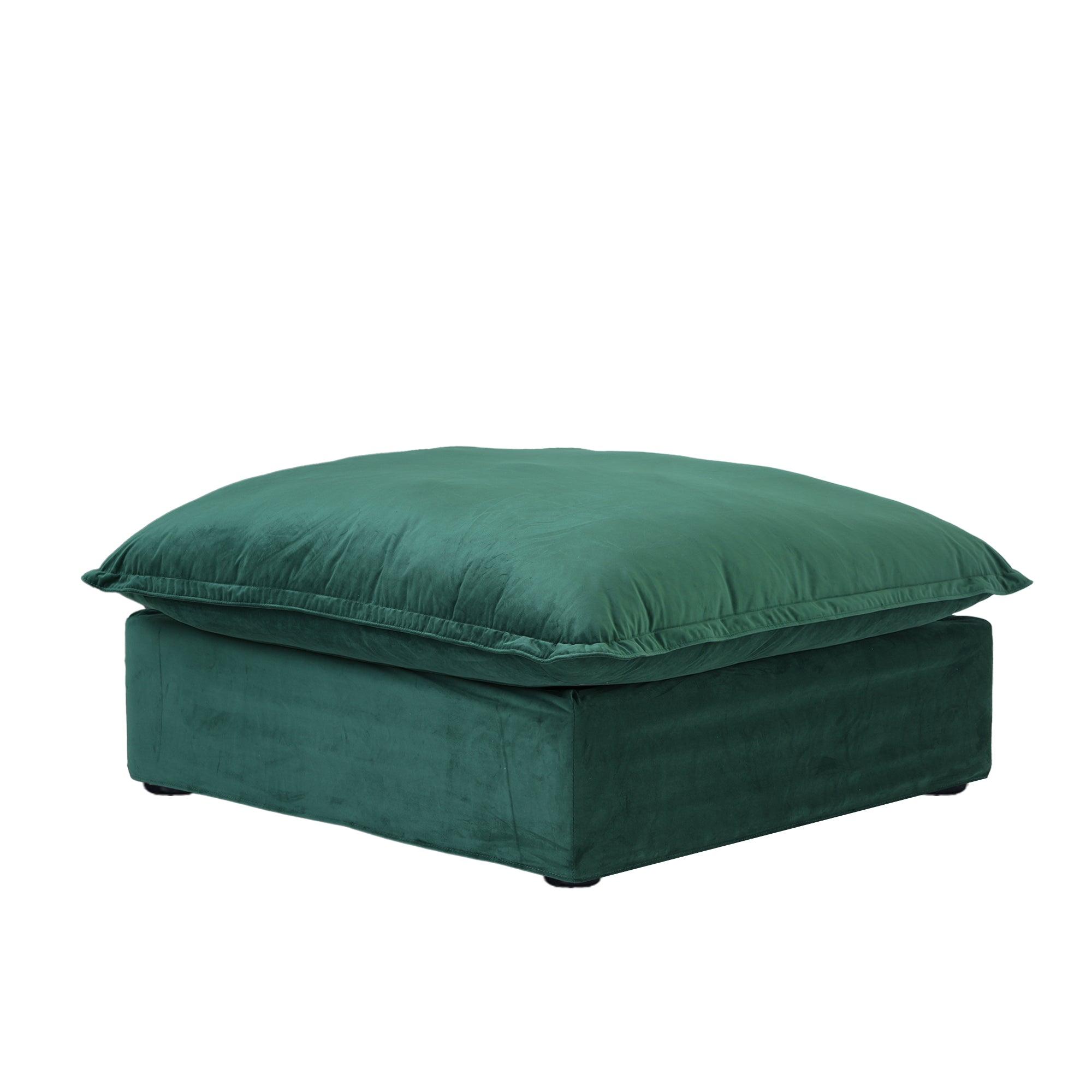 A modern green velvet hidden storage ottoman.