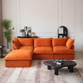 Orange velvet 3-seater L-shaped sectional with washable covers and storage ottoman.