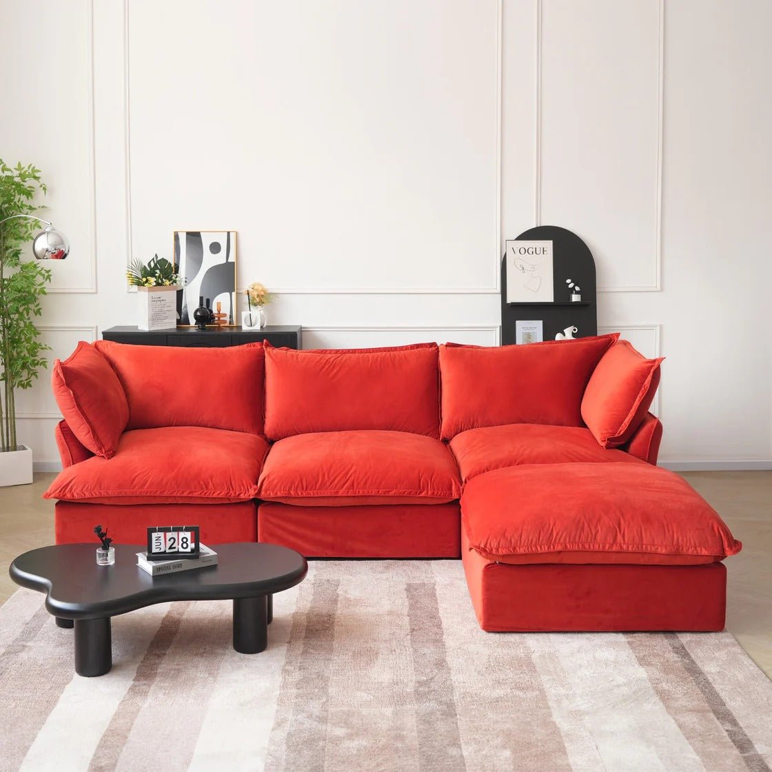 Red velvet 3-seater L-shaped sectional with washable covers and storage ottoman.