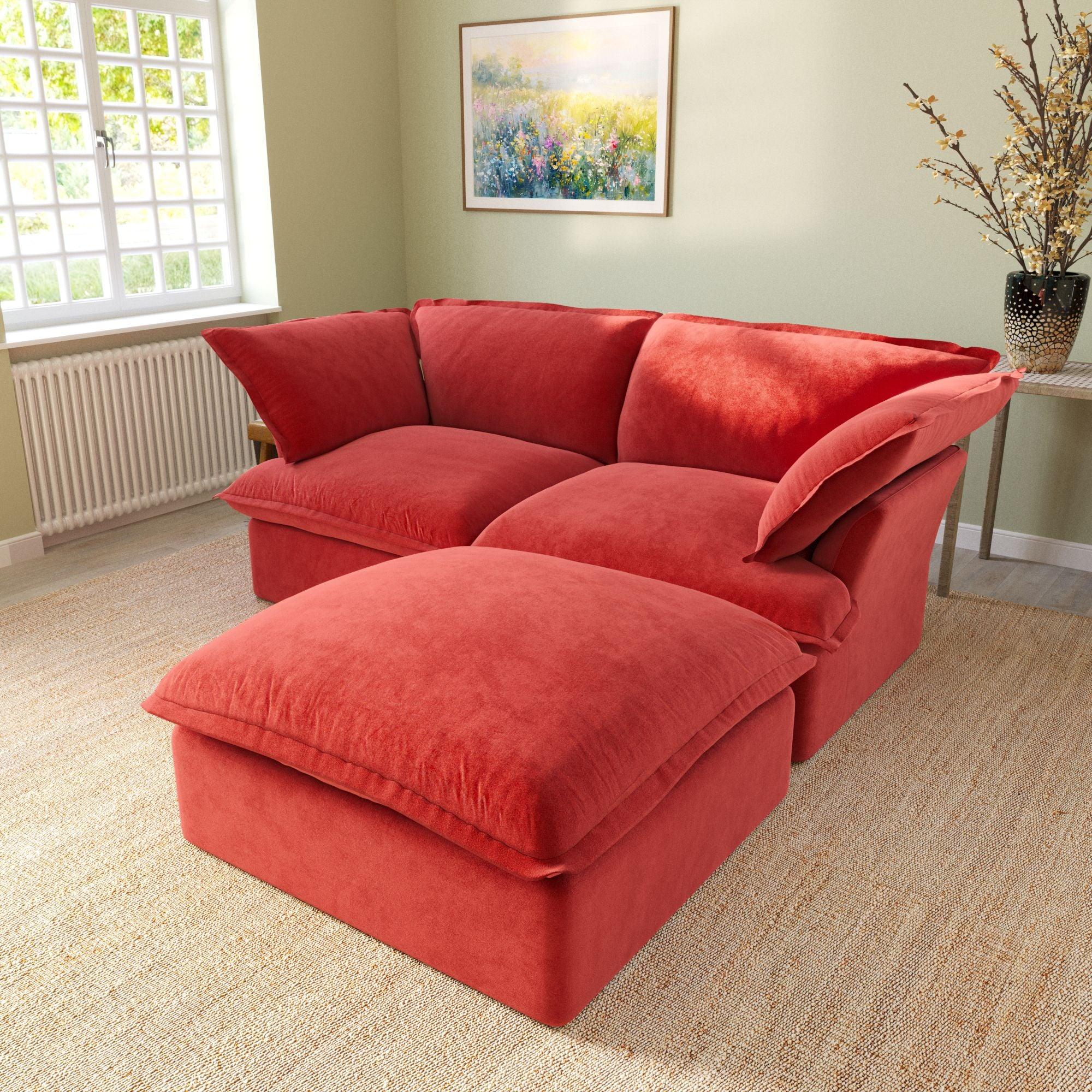 Modular velvet loveseat sofa with storage ottoman and curved armrests in red, side