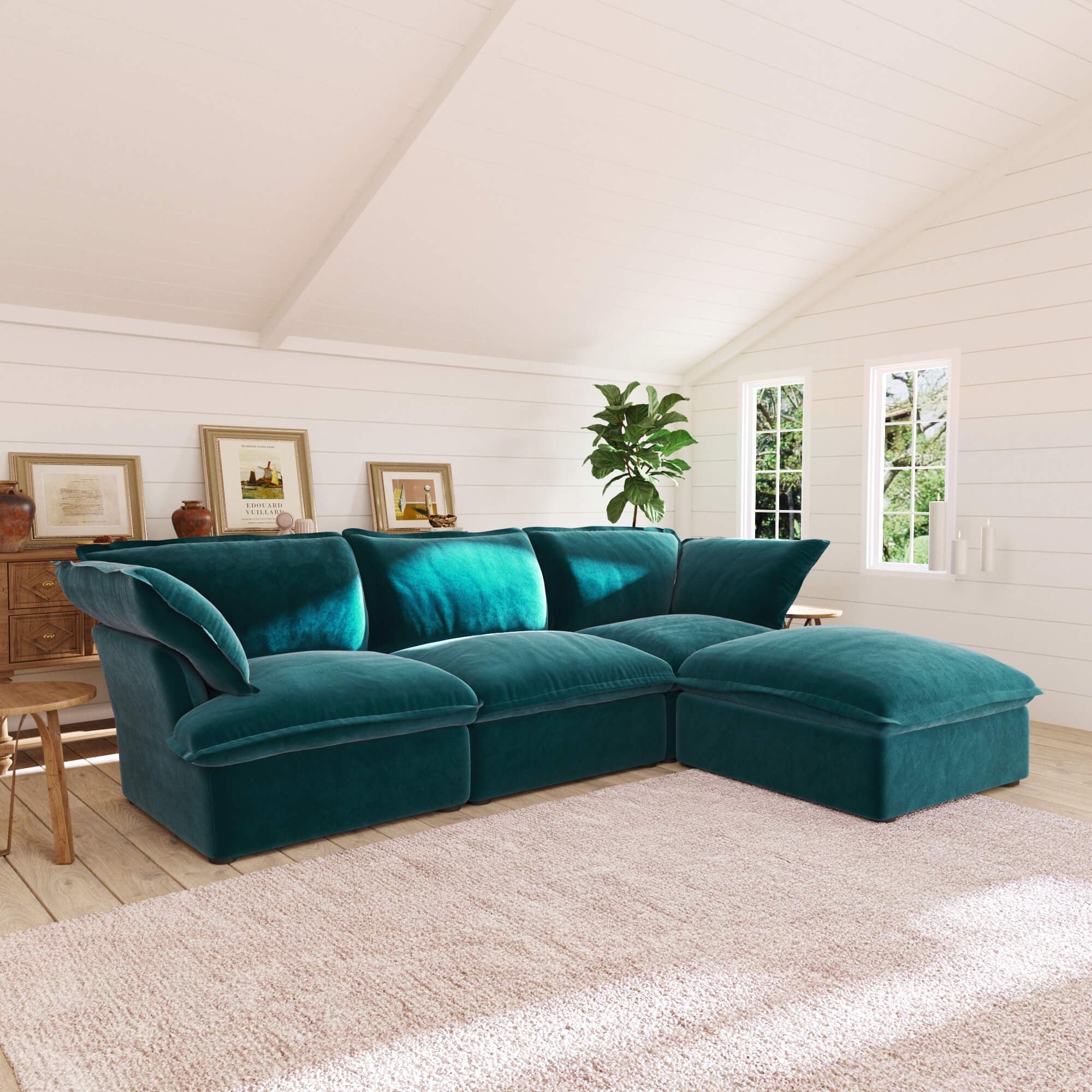 Turquoise L-shaped 4-seater sectional sofa in a living room with white walls and wooden floor.