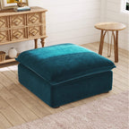 Teal ottoman in a room with wooden furniture and a white wall.