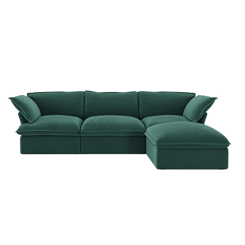 Green sectional sofa on a white background