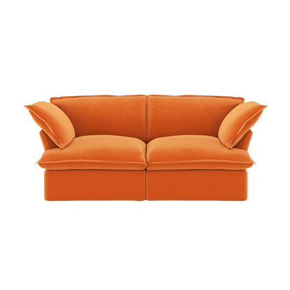 Orange sofa with curved armrests on a white background