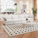 A white linen sectional 4-seat sofa arranged in a living room setting with deep seating.