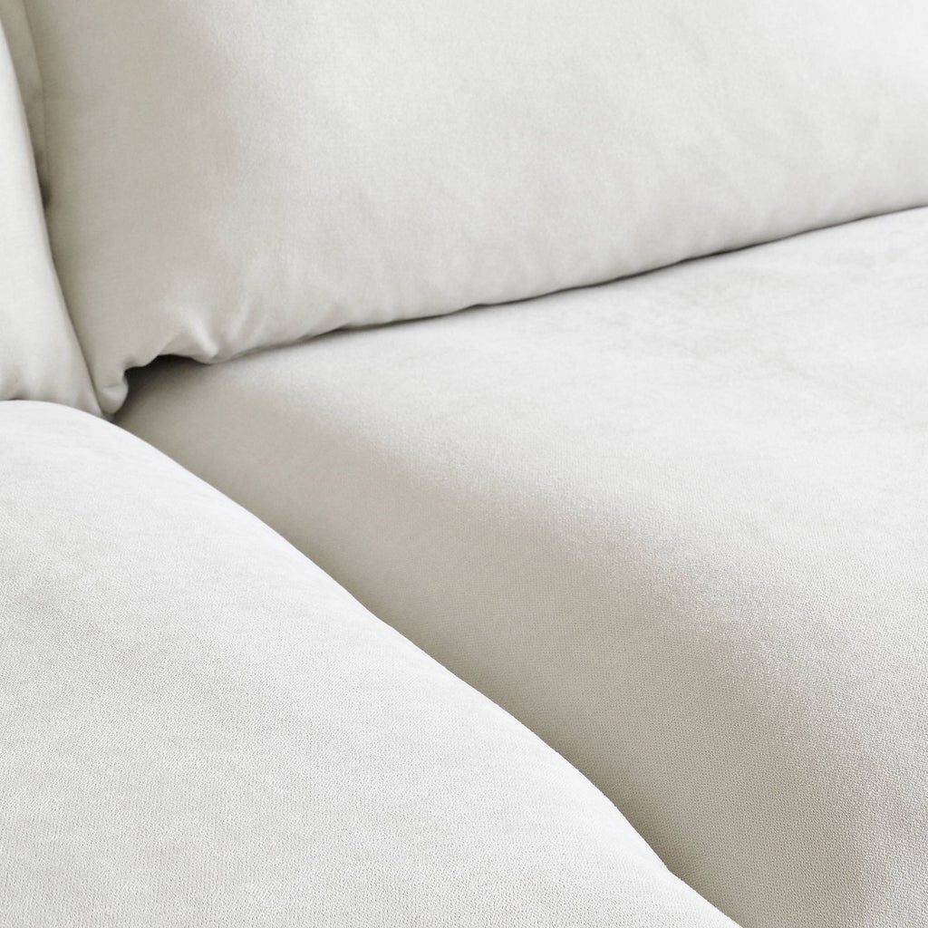 Close-up of a linen fabric of a white sofa