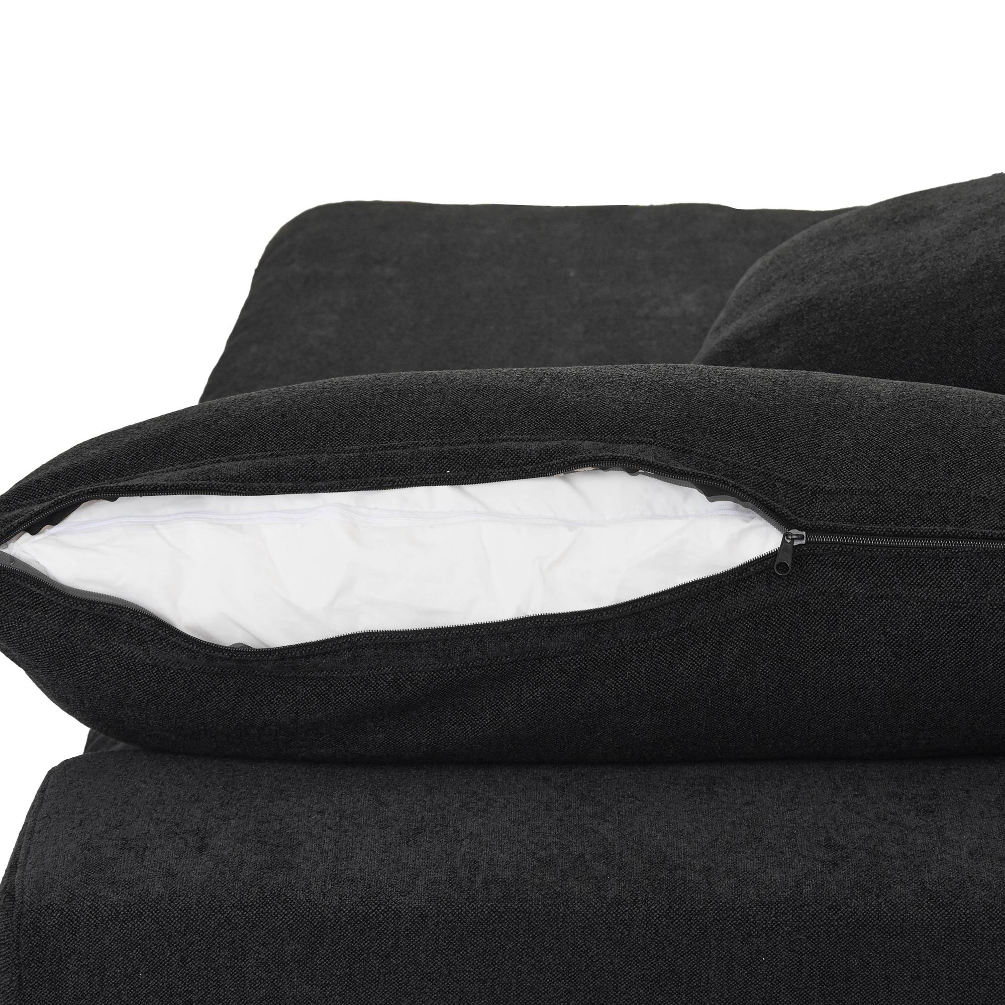 Close-up of a backrest pillow with unzipped cover