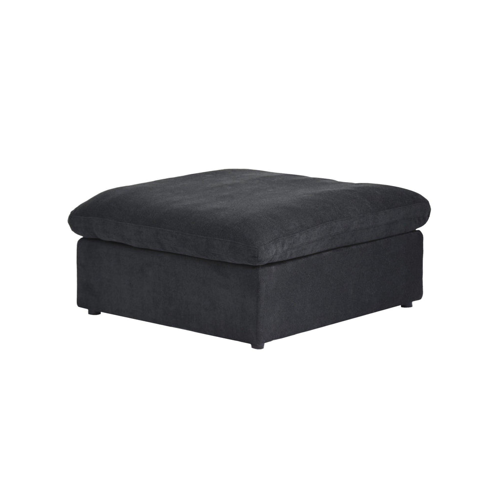 Black ottoman with a hidden storage on a white background