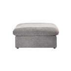 A gray linen upholstered ottoman with a cushioned top.