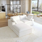 Cloud modular 2-seater sectional with a storage ottoman, upholstered in white linen.