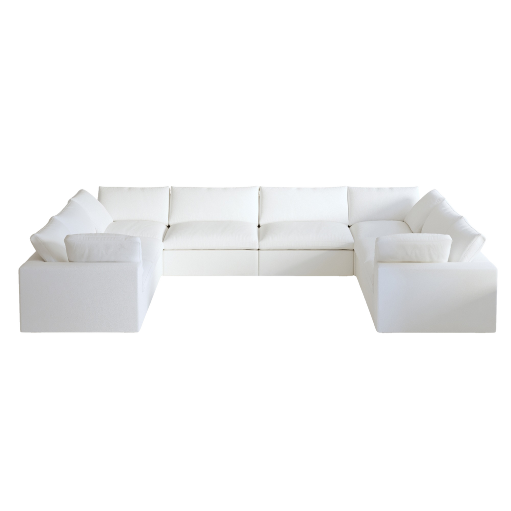 White modular 8-seat pit-style sofa on a white background
