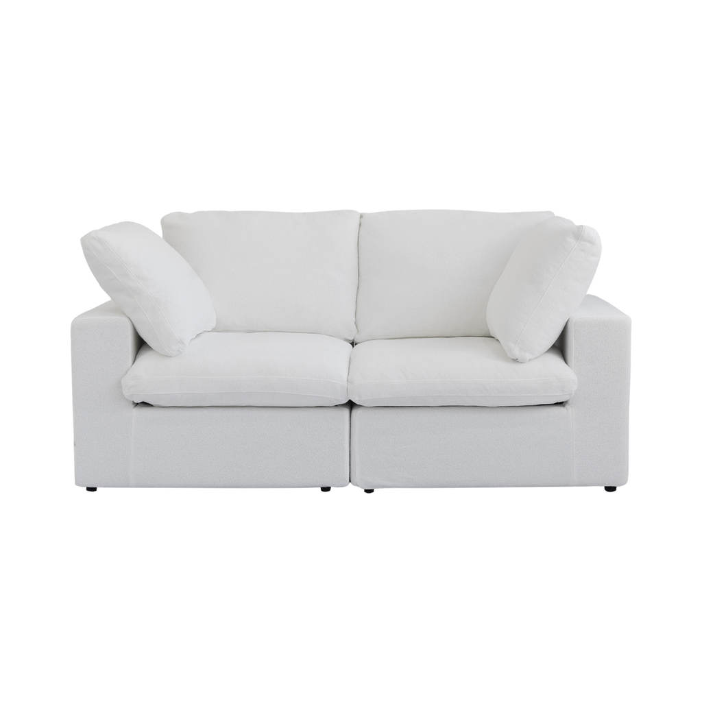 White loveseat sofa with two cushions on a white background