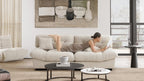 Person laying down on a microfiber suede sofa.