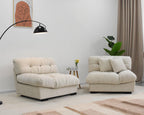 An 89-inch beige microfiber suede sofa seat split in two with a solid hardwood frame, presented in a cold lightning in a living room setting with minimalistic decor.