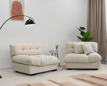 An 89-inch beige microfiber suede sofa seat split in two with a solid hardwood frame, presented in a cold lightning in a living room setting with minimalistic decor.