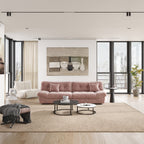 A pink microfiber suede sofa in a cold lightning with splitable seats placed in a room with minimalistic decor