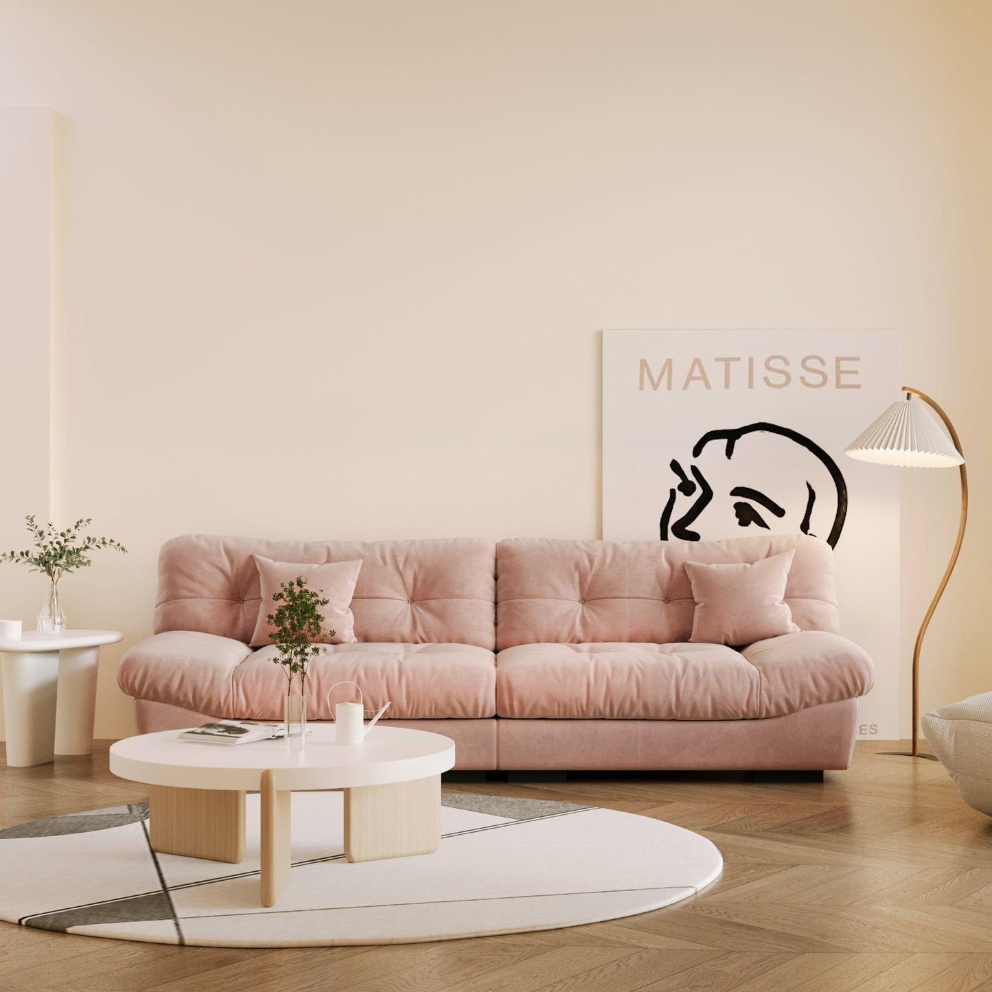 A pink microfiber suede sofa in a warm lightning with splitable seats placed in a room with minimalistic decor, including a 'Matisse' poster on the wall.