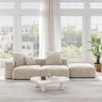 A beige corduroy 2-seater open end sectional with washable covers and detachable armrests.