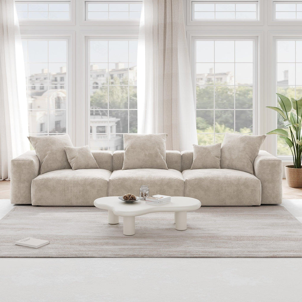 A beige corduroy 3-seat sectional modular sofa with detachable armrests and removable covers, pet-friendly, displayed in a bright living space.