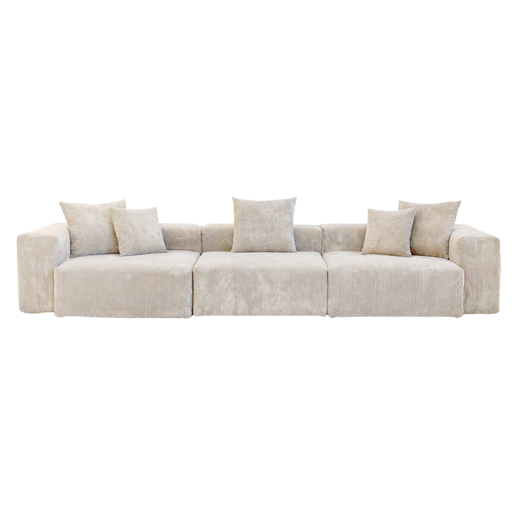 Beige sectional 3-seat sofa with cushions on a white background