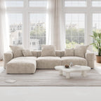 A beige L-shaped corduroy modular sofa with detachable armrests and removable covers, pet-friendly, displayed in a bright living space.