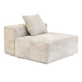 Beige armless chair with washable covers upholstered in corduroy fabric.