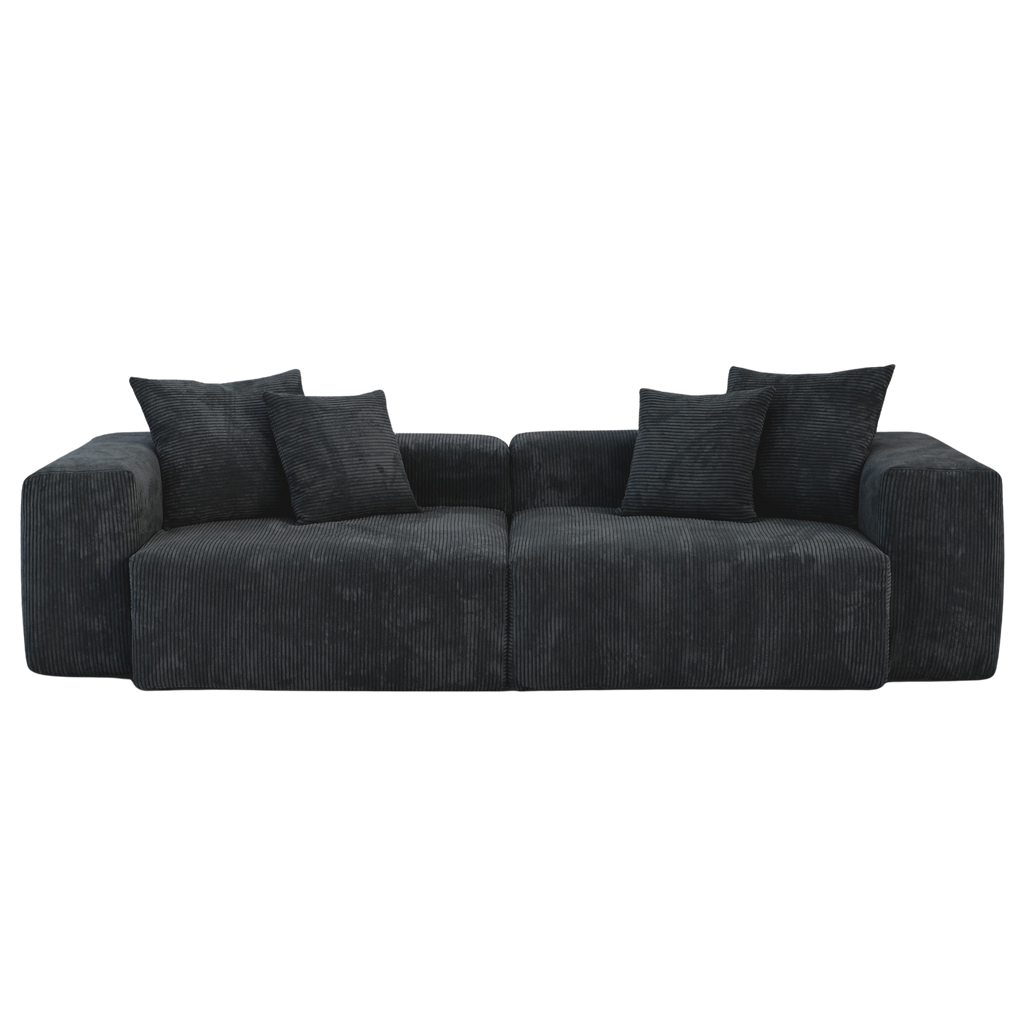 Black loveseat sectional sofa with cushions on a white background
