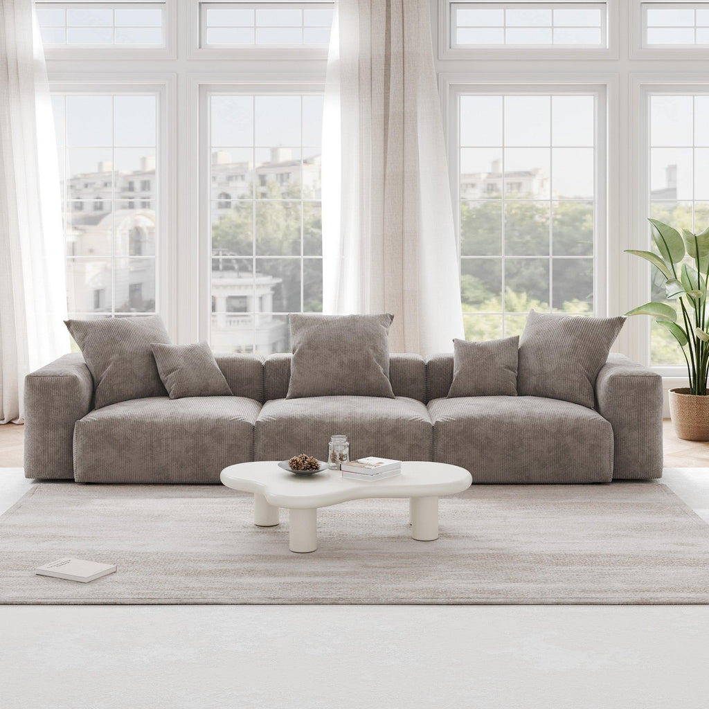 A brown corduroy 3-seat sectional modular sofa with detachable armrests and removable covers, pet-friendly, displayed in a bright living space.