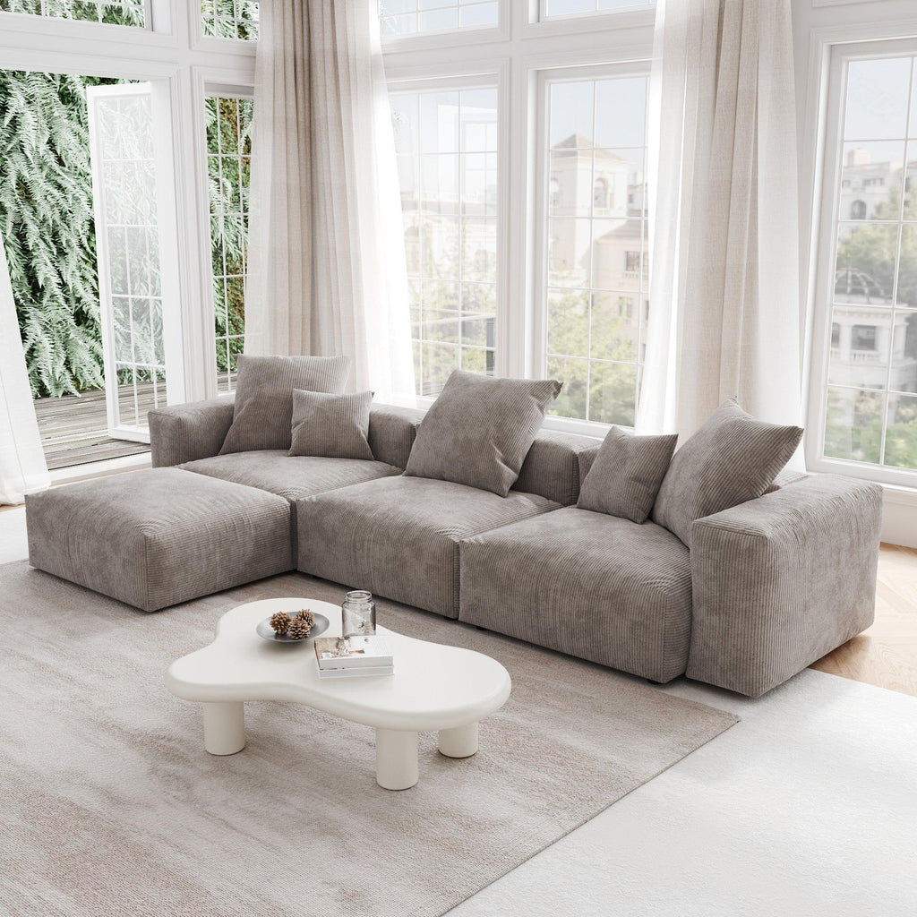 A brown L-shaped corduroy modular sofa with detachable armrests and removable covers, pet-friendly, displayed in a bright living space.