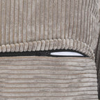 Close-up of a zipper on a brown corduroy sofa cover