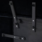 Underside frame and modular connectors of a black linen chair