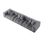 Gray modular 3-seat sofa with multiple cushions on a white background