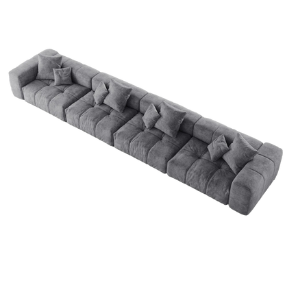 Gray 4-seat sectional sofa with multiple cushions on a white background