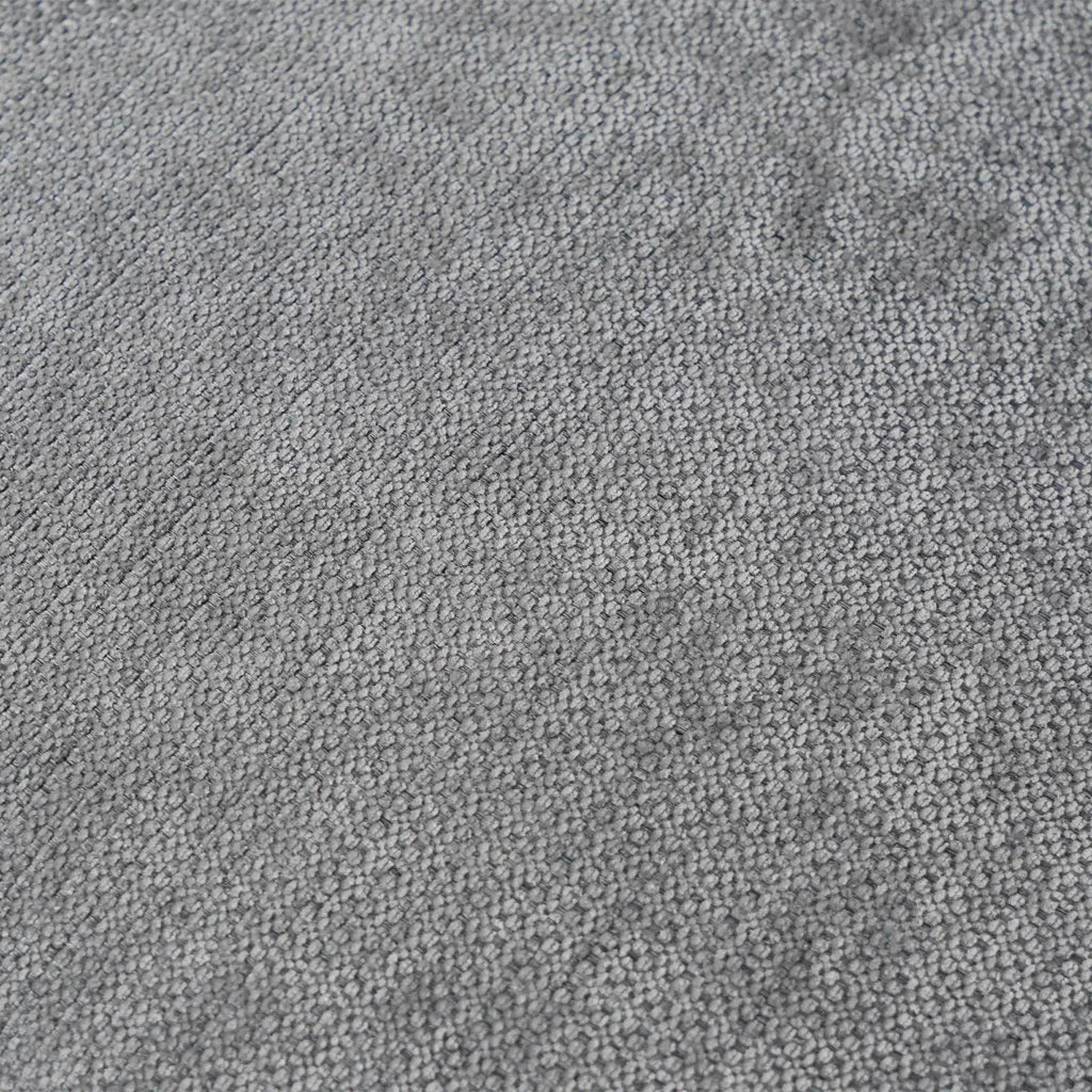 Close-up of gray linen fabric of a sofa