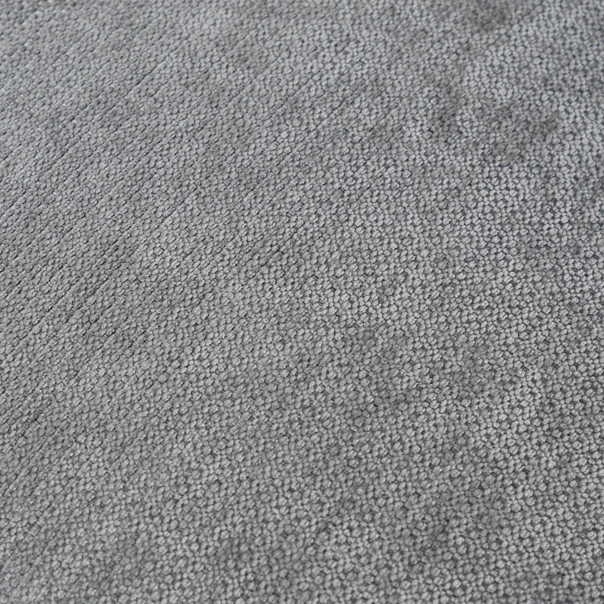 Close-up of gray linen fabric of a sofa