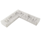White V-shaped corner sectional sofa on a white background
