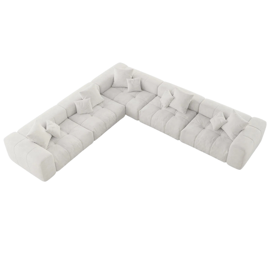 White V-shaped corner sectional sofa on a white background