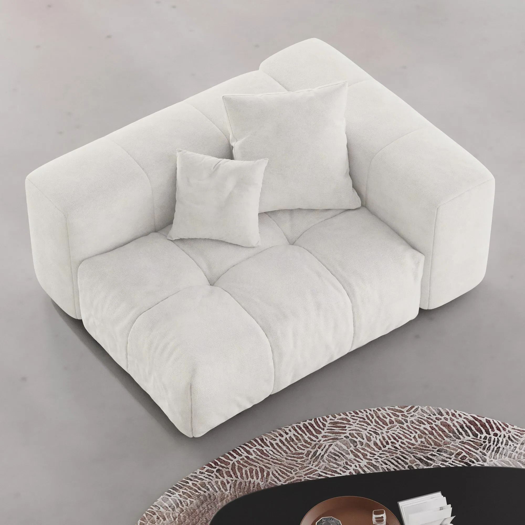 White upholstered left end chair with cushions on a gray background