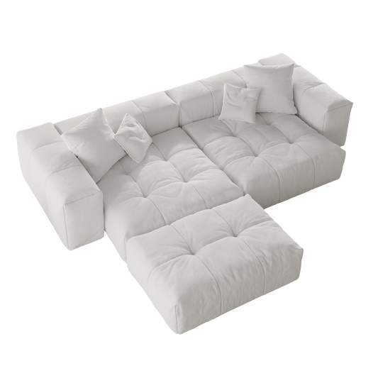 White loveseat sectional sofa with ottoman on a white background