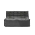 Gray tufted sofa on a white background