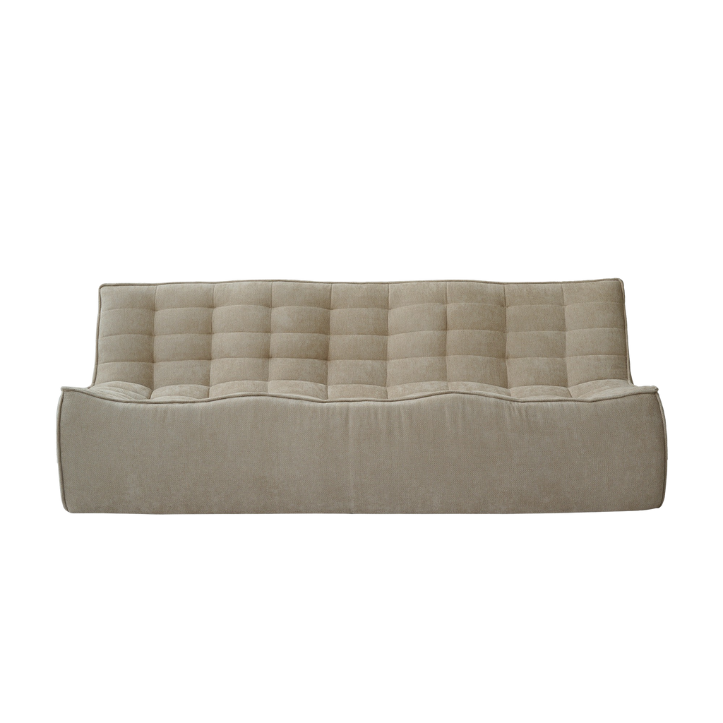 Beige tufted floor waffle sofa on a white background