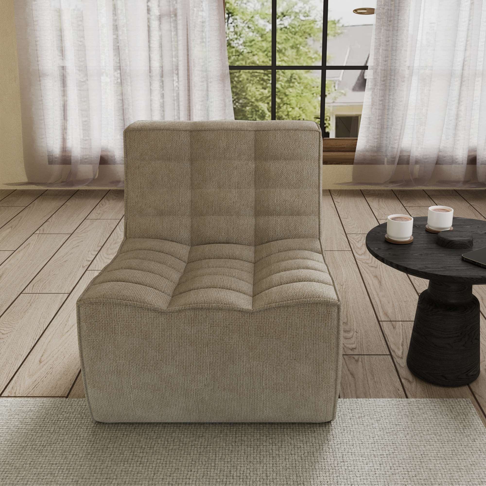 A khaki chenille accent chair with a minimalist design, positioned in a room with a window, curtains, and a small round side table.