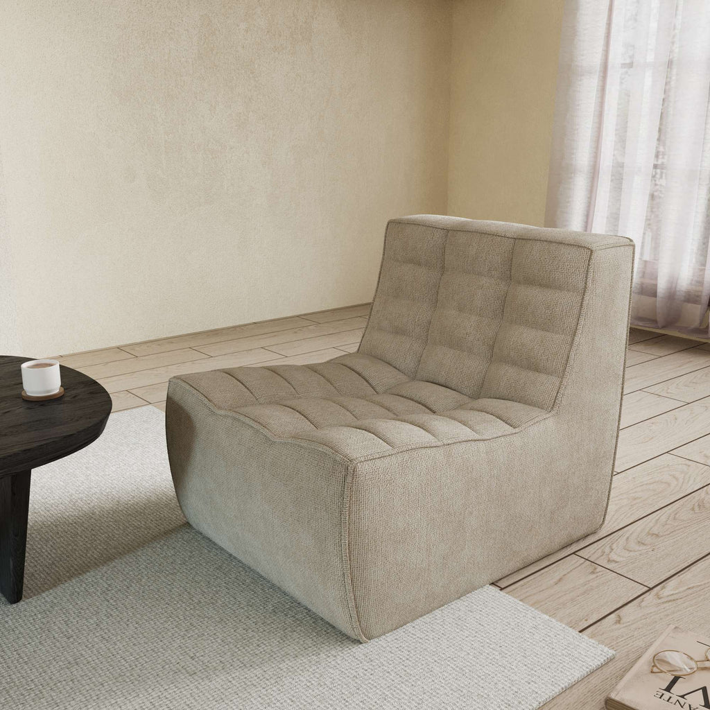 A khaki chenille accent chair with a minimalist design