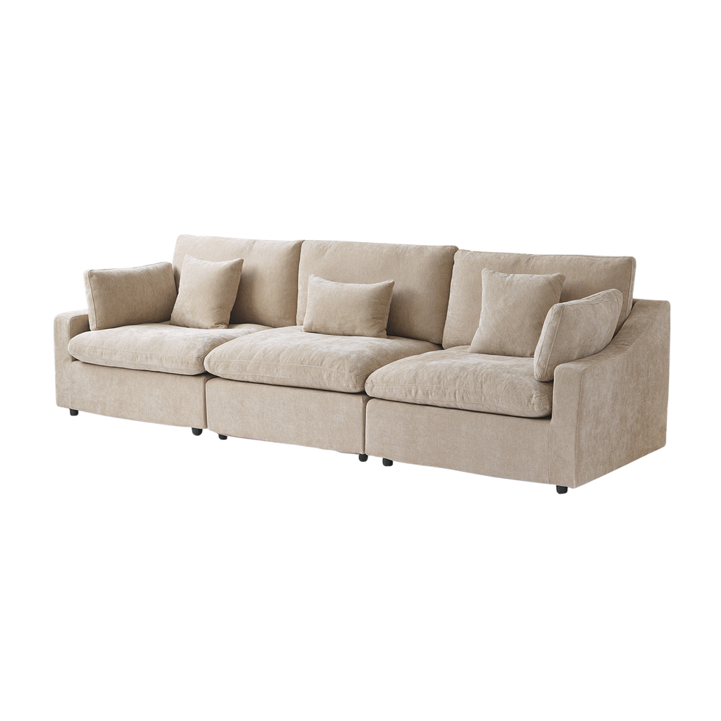 Beige sofa with cushions on a white background