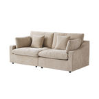 Beige sofa with four accent pillows on a white background