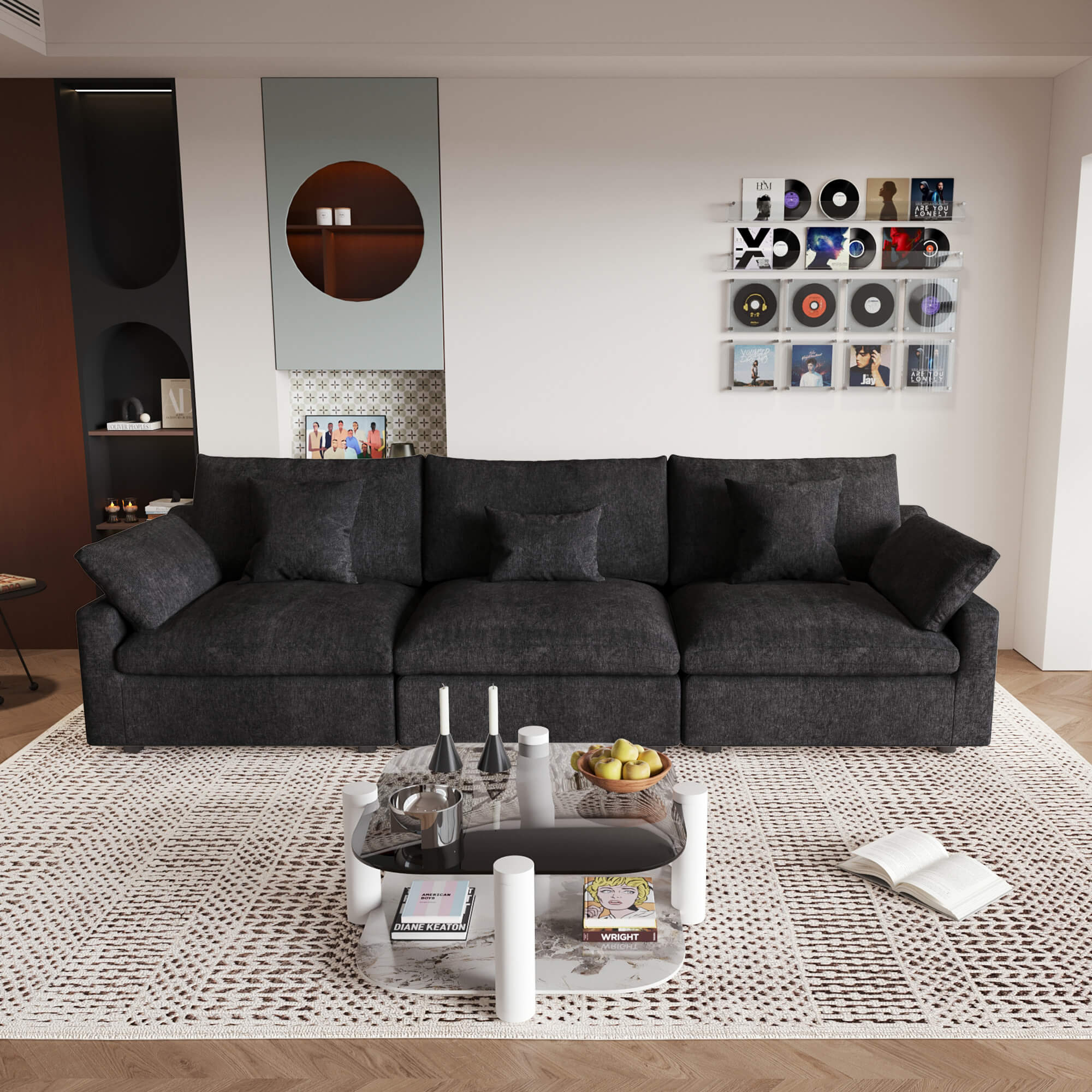 A modern black 3-seater sectional sofa with washable cushions and pillow covers, placed in a room with a minimalist design.
