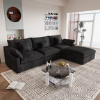 An L-shaped black sectional sofa with removable cushions and pillow covers, placed in a living room setting.