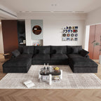 A large black U-shaped sectional sofa with removable cushions and pillow covers, placed in a modern living room setting.
