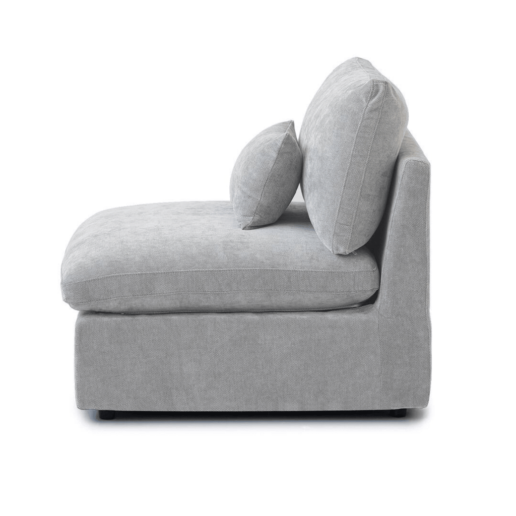 Washable armless modular seat with removable covers and accent pillow in linen-cotton blend.