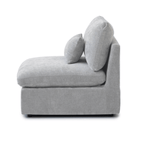Washable armless modular seat with removable covers and accent pillow in linen-cotton blend.